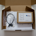 Nexus-II opened box Nexus-II opened box showcasing the contents, which include a boxed Nexus-II, cable, and instruction manual