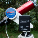 Nexus-II on a Vixen Porta mount Nexus-II on a Vixen Porta mount, set up outside in a backyard with a leafy green background