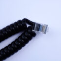 Coiled encoder cable close up view of plug