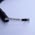 Coiled encoder cable close up view of the tag